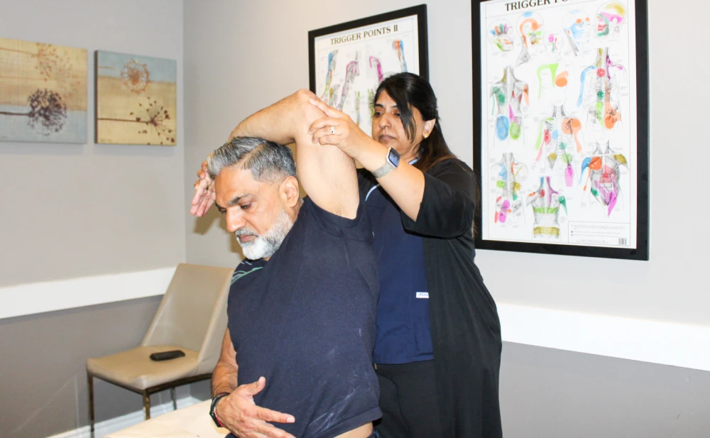Physiotherapist treating patient